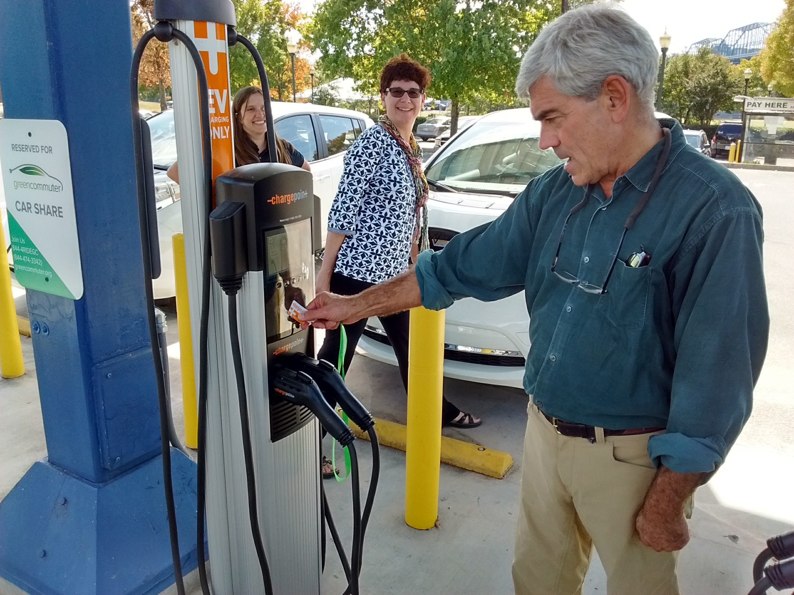 Longtime Chattanooga electric car advocate Jim Frierson drives one of Green Commuter Chattanooga's Nissan Leafs on Oct. 13, the day the program went live.