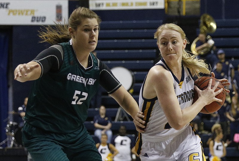 UTC forward Sydney Vanlandingham breaks around Wisconsin-Green Bay forward Madison Wolf for a layup during the Lady Mocs' home basketball game against the Wisconsin-Green Bay Phoenix at McKenzie Arena on Friday, Nov. 25, 2016, in Chattanooga, Tenn.