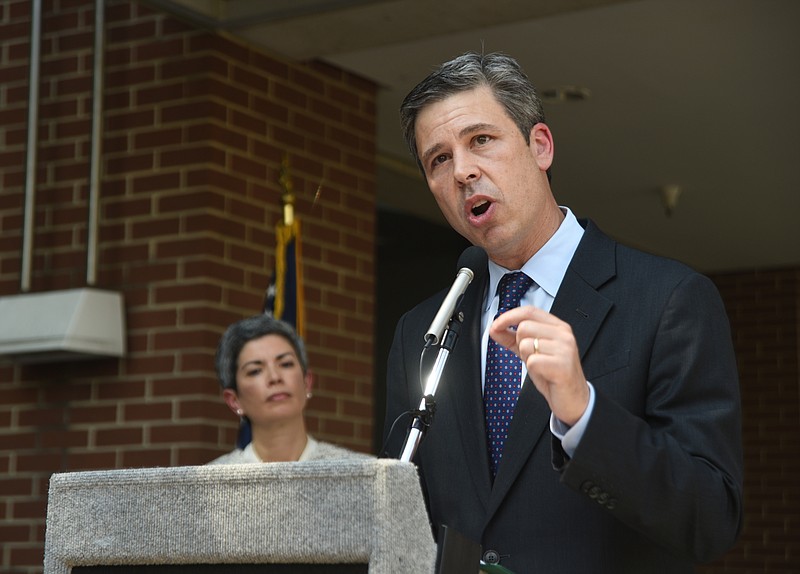 Mayor Andy Berke announces Monday, Sept. 6, 2016 at the Development Resource Center that he will be running for re-election as wife Monique looks on.