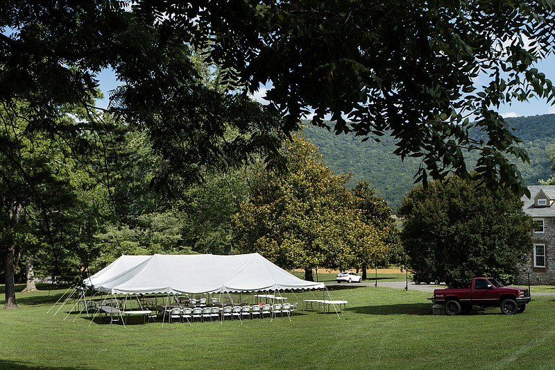 A tent is set up for a wedding at Mountain Cove Farms on Saturday, June 20, 2015, in Chickamauga, Ga.