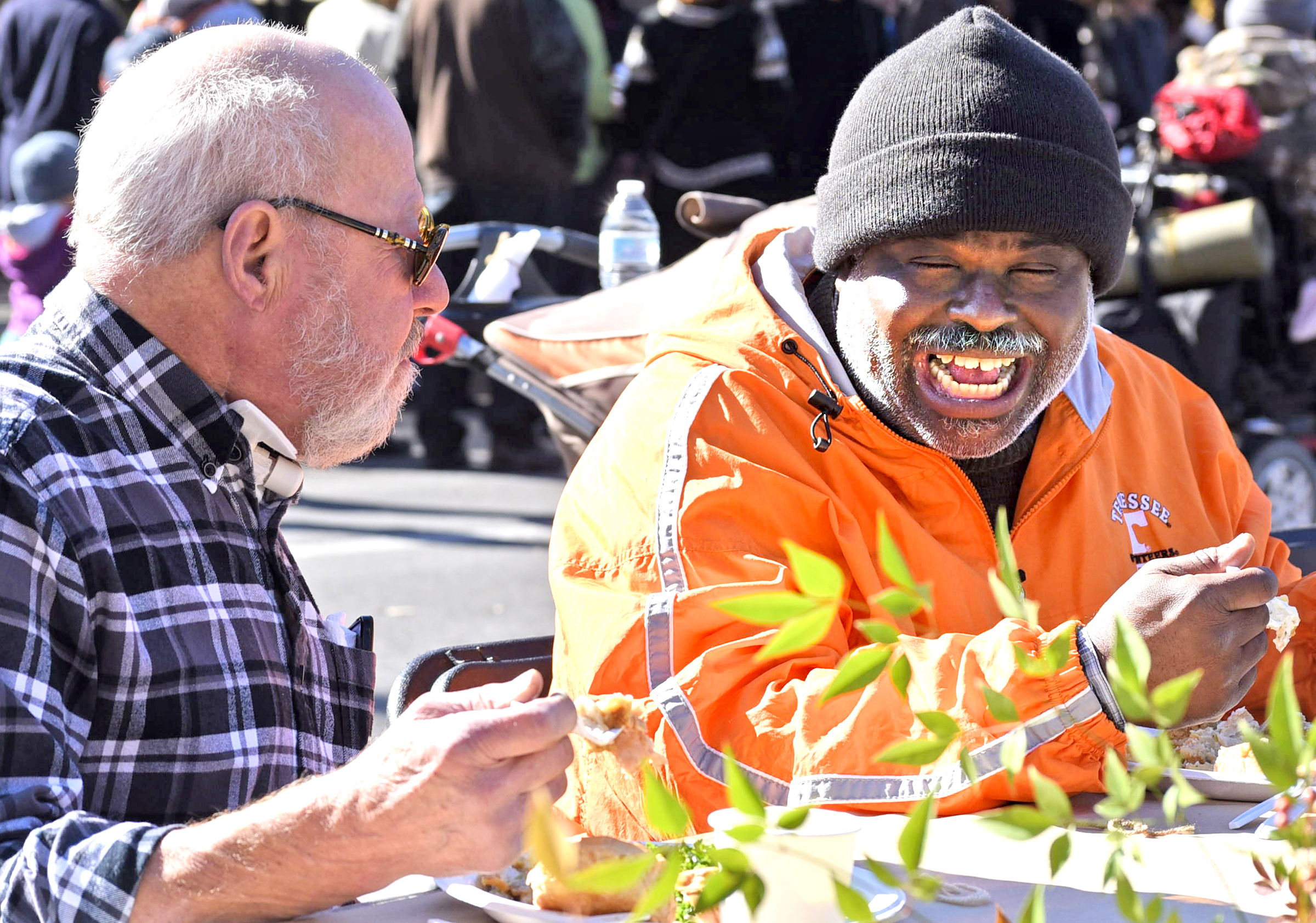 Ulysses Marshall, right, and Keith Smith share a laugh during their meal.
