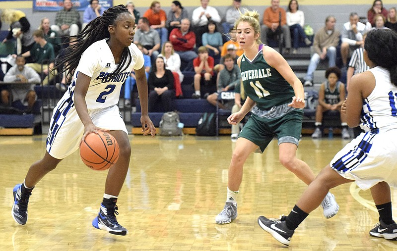 CSAS's Lennex Walker (2) dribbles downcourt as teammate Jaida Harris (14) sets s pick for Silverdale's Emily Harkleroad (11).  The Silverdale Baptist Academy Seahawks visited the Chattanooga School for Arts & Sciences Patriots in TSSAA girls's basketball action on November 29, 2016. 