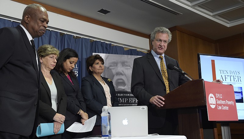 
              Richard Cohen, president of the Southern Poverty Law Center, right, speaks during a news conference at the National Press Club in Washington, Tuesday, Nov. 29, 2016. Cohen, along with, from left, Wade Henderson, President and CEO of The Leadership Conference on Civil and Human Rights, American Federation of Teachers President Randi Weingarten, Brenda Abdelall, with Muslim Advocates, and Janet Murguia, the President and CEO of the National Council of La Raza, called on President-elect Donald Trump to publicly denounce racism and bigotry. (AP Photo/Susan Walsh)
            