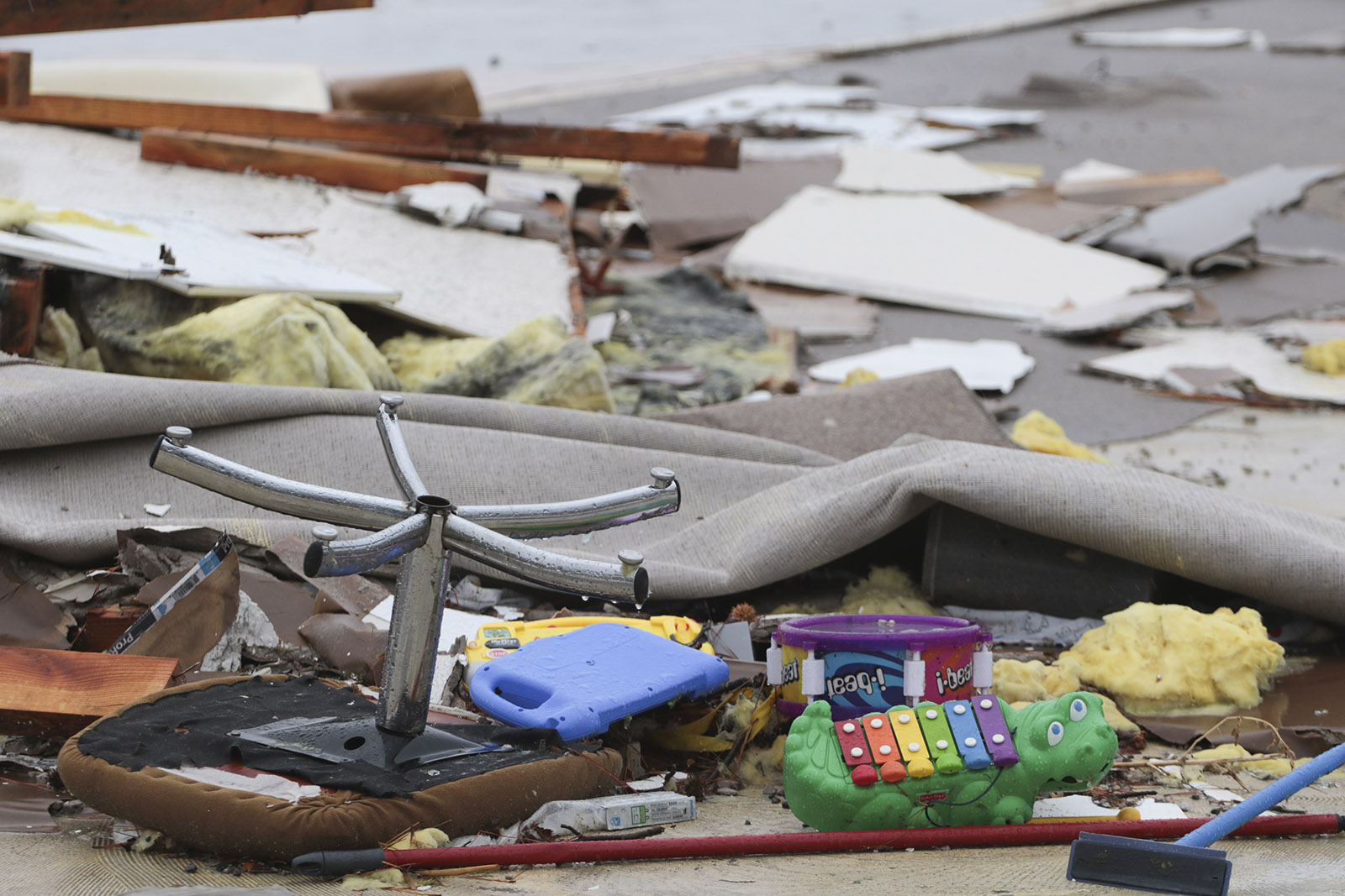 Staff Photo by Dan Henry / The Chattanooga Times Free Press- 11/30/16. Debris and childrens toys are scattered about on the foundation of what use to be a day care located in Ider, AL., which was destroyed by a suspected tornado on Wednesday, Nov 30, 2016. The overnight storm also destroyed structures and killed three people in the neighboring town of Rosalie, AL.