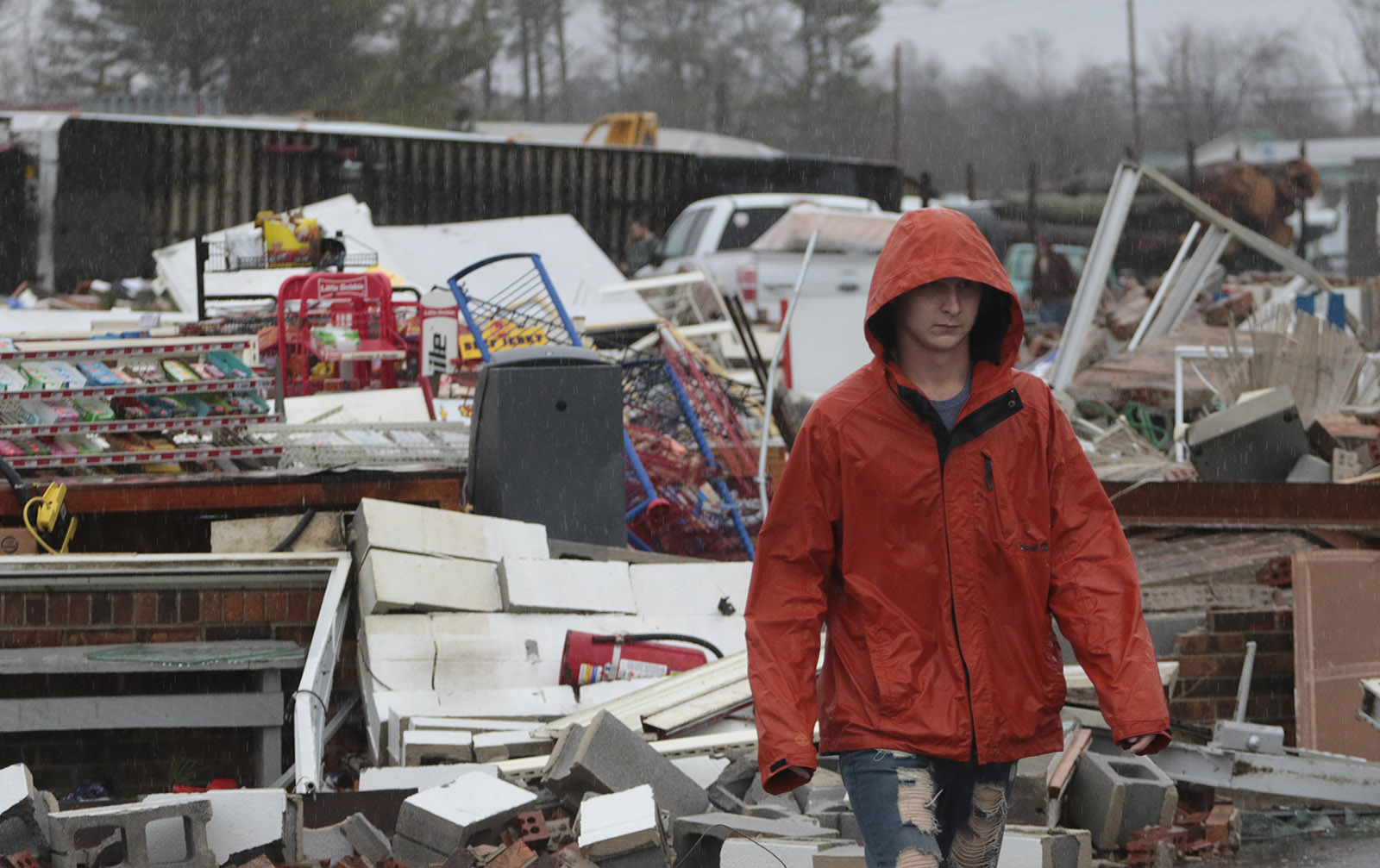 Staff Photo by Dan Henry / The Chattanooga Times Free Press- 11/30/16. Tyler Jeffery surveys the damage done to the Rosalie Plaza Grocery in Rosalie, AL, on Wednesday, Nov 30, 2016 where a suspected tornado touched down overnight killing three from the community.