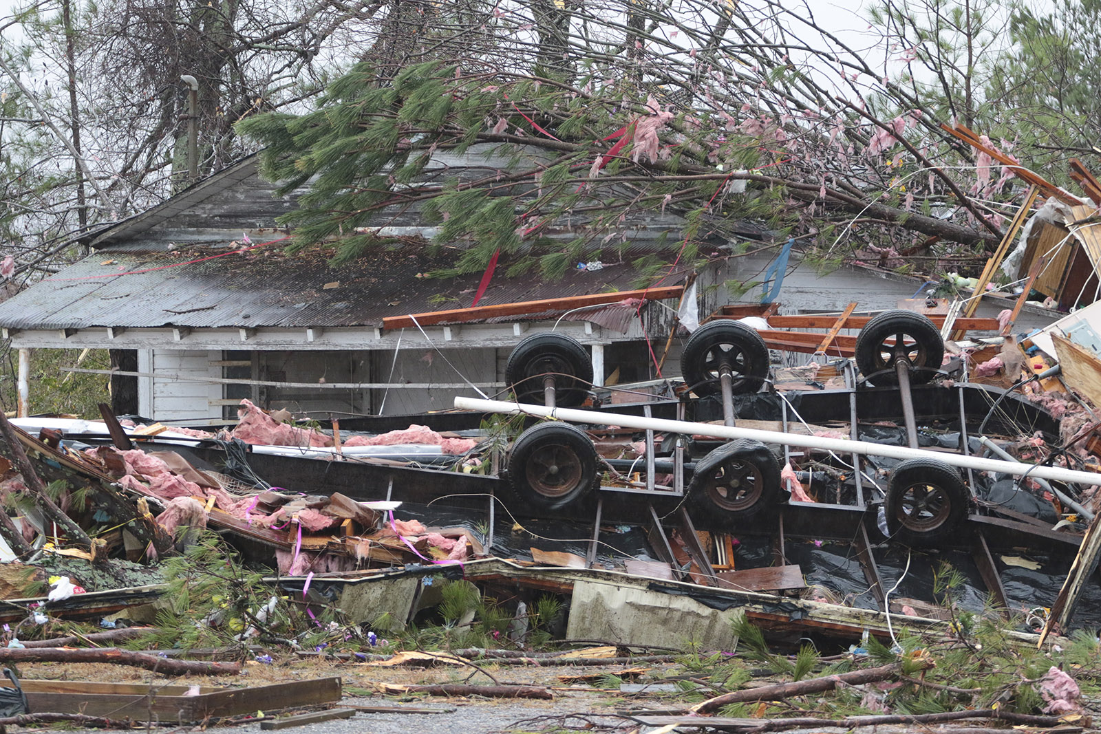 Staff Photo by Dan Henry / The Chattanooga Times Free Press- 11/30/16. A tailer where three died was relocated into the neighbors yard after a suspected tornado hit the Rosalie, AL, community on Wednesday, Nov 30, 2016.