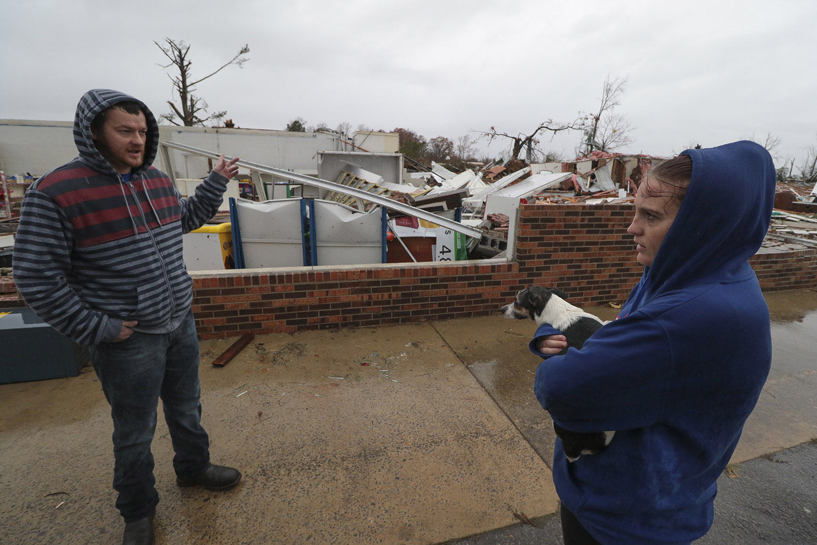 Staff Photo by Dan Henry / The Chattanooga Times Free Press- 11/30/16. Chris Summerford, left, speaks to Shaylyn Jeffery about the destruction of her tee-shirt shop she had opened one month earlier in the former Rosalie Plaza Grocery in Rosalie, AL, on Wednesday, Nov 30, 2016 where a suspected tornado touched down overnight killing three from the community.