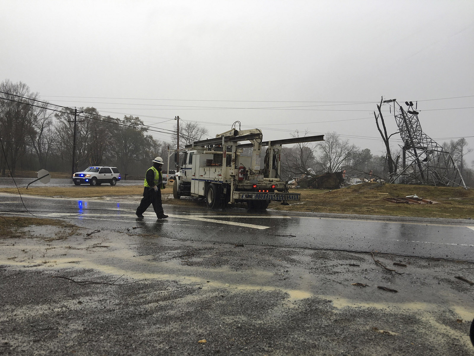 Responders prepare to leave the site of a damaged transformer located on Hwy 411, south of the Hwy 64 junction.