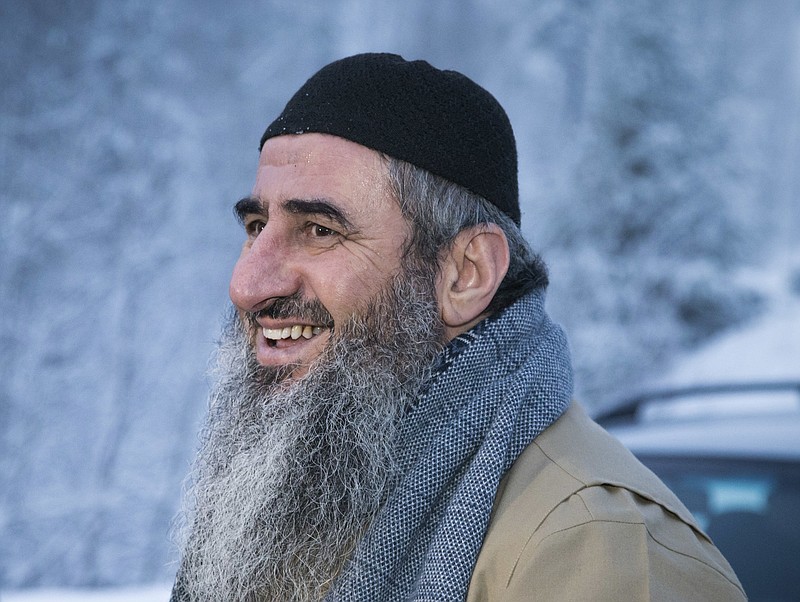 
              FILE - In this Jan. 25, 2015 file photo, Iraqi-born cleric Mullah Krekar, smiles after being released from Kongsvinger prison, in Kongsvinger, Norway. Italy has decided to pull back an extradition request for Najmaddin Faraj Ahmad, also known as Mullah Krekar, Norway's security service said on Wednesday, Nov. 30, 2016. (Audun Braastad, NTB scanpix via AP, File)
            
