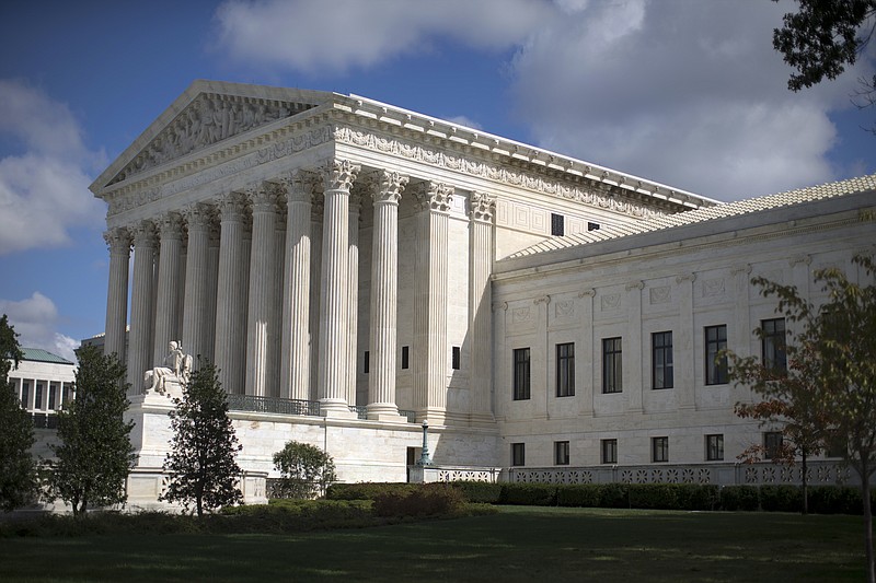 
              FILE - In this Oct. 5, 2015 file photo, the Supreme Court is seen in Washington. A seemingly divided Supreme Court tried to figure out Wednesday whether the government can detain immigrants indefinitely without providing hearings at which they could argue for their release.   (AP Photo/Carolyn Kaster, File)
            