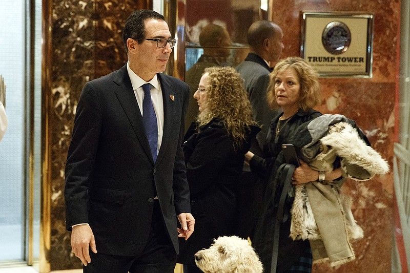 Steven Mnuchin, national finance chairman of President-elect Donald Trump's campaign, walks to lunch at Trump Tower, Tuesday, Nov. 29, 2016, in New York. (AP Photo/Evan Vucci)
