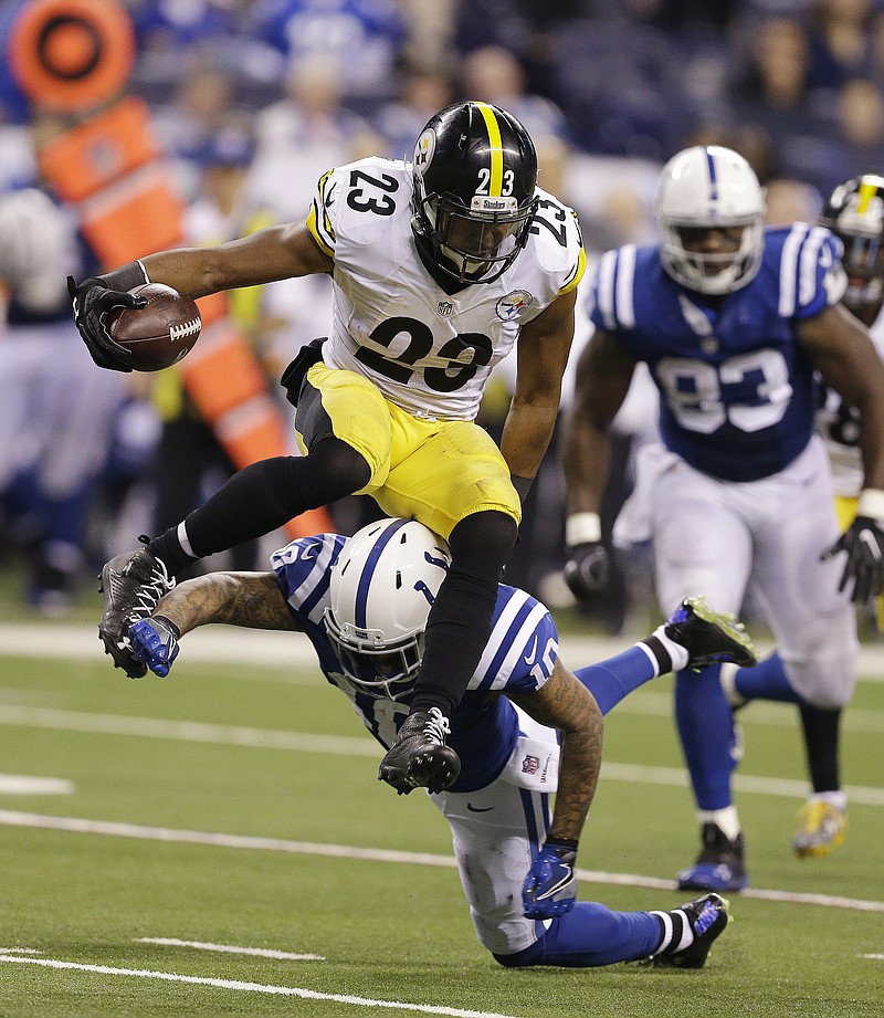 
              FILE - In this Nov. 24, 2016 file photo, Pittsburgh Steelers' Mike Mitchell (23) jumps over Indianapolis Colts wide receiver Donte Moncrief (10) after making an interception during the second half of an NFL football game in Indianapolis. The Thursday night clash between the Steelers and the Colts was the week’s most-watched show, scoring nearly 21 million viewers. (AP Photo/Michael Conroy, File)
            