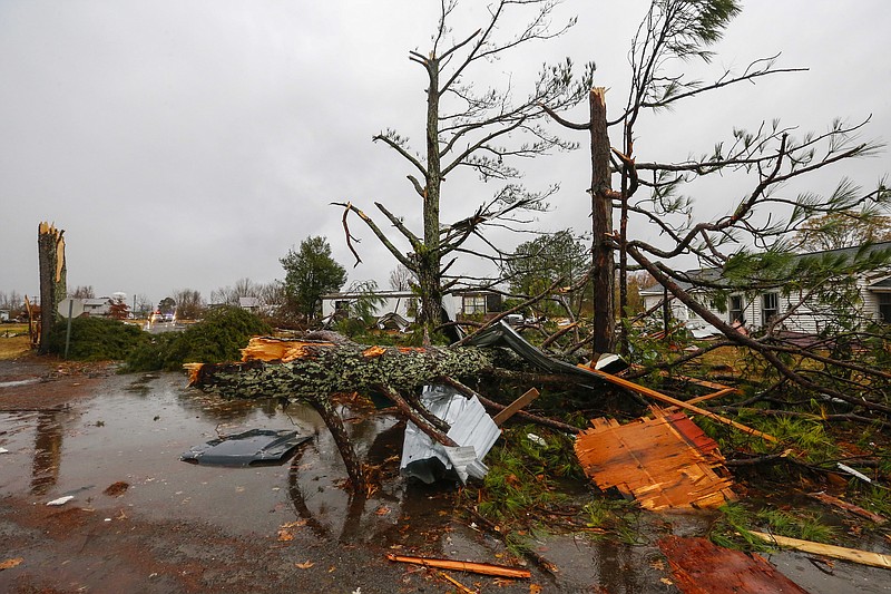 Fallen trees line the streets after a suspected tornado ripped through the town of Rosalie, Ala., Wednesday, Nov. 30, 2016, in Rosalie, Ala. Possible tornadoes swept through parts of Alabama and Tennessee overnight, as heavy rains from storms moving across the South produced flooding in areas previously suffering from months of drought. (AP Photo/Butch Dill)