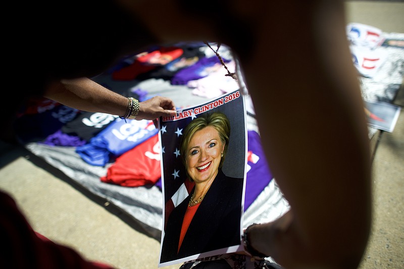 Souvenirs at a campaign rally for Democratic presidential candidate Hillary Clinton, the day after the Democratic National Convention, at Temple University in Philadelphia in July. Computer systems connected to the campaign of Hillary Clinton, the Democratic presidential nominee, were hacked in an attack that appears to have come from Russia intelligence services, a federal law enforcement official said.