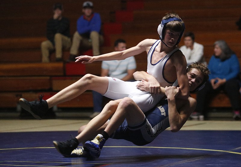 Soddy-Daisy wrestler Jacob Allen, bottom, scores on William Blount wrestler Jonathan Simpson in their 106-lb bout during Soddy-Daisy's prep wrestling meet against William Blount at the Soddy-Daisy High School Wrestling Gym on Thursday, Dec. 1, 2016, in Soddy-Daisy, Tenn.