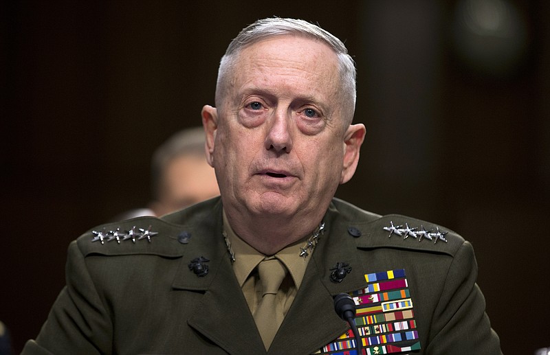 
              FLE - In this March 5, 2013, file photo, then-Marine Gen. James Mattis, commander, U.S. Central Command, testifies on Capitol Hill in Washington. President-elect Donald Trump says he will nominate retired Gen. James Mattis to lead the Defense Department.(AP Photo/Evan Vucci, File)
            