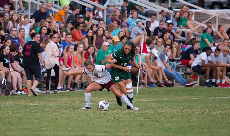 Lee University senior midfielder Kinsey Cichowitz, left, is the first NSCAA first-team NCAA Division II All-American in the program's history.