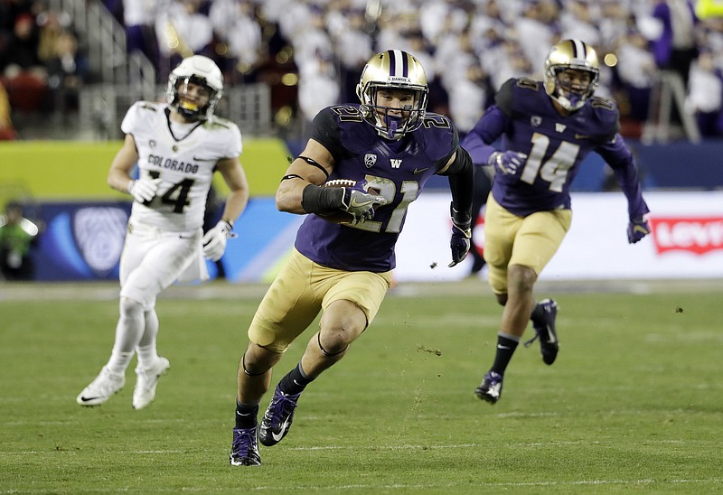 
              Washington defensive back Taylor Rapp (21) runs after intercepting a Colorado pass during the second half of the Pac-12 Conference championship NCAA college football game Friday, Dec. 2, 2016, in Santa Clara, Calif. (AP Photo/Marcio Jose Sanchez)
            