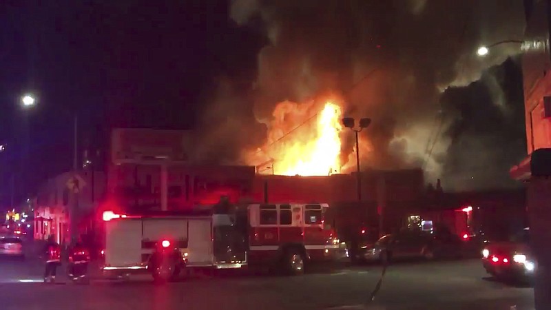 
              This photo taken from video provided by @Oaklandfirelive shows the scene of a fire in Oakland, early Saturday, Dec. 3, 2016.   The blaze began at about 11:30 p.m. on Friday during a party at a warehouse in the San Francisco Bay Area city.  Several people were unaccounted for.   Oakland Fire Department posted several messages throughout the night on its Twitter social media network account, including the latest one in the morning saying that fire crews would remain on the scene for several more hours to extinguish hot spots(@Oaklandfirelive via AP)
            