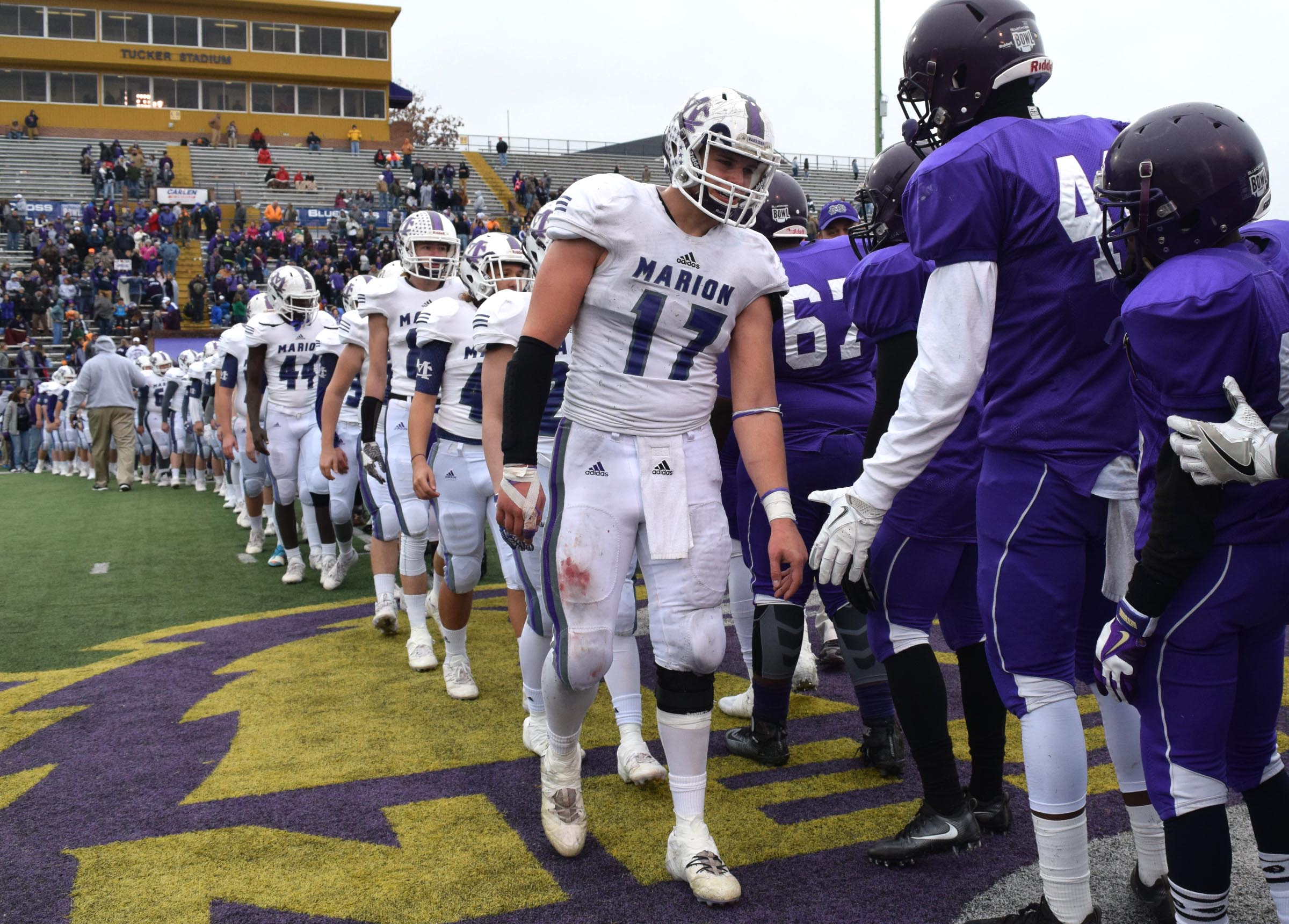 Alex Kirkendoll (17) and the rest of the Warriors shake hands with the Trezevant players. The Marion County Warriors faced the Memphis Trezevant Bears in the Class AA TSSAA State Football Championship played in the BlueCross Bowl at Tennessee Tech in Cookeville on December 3, 2016.