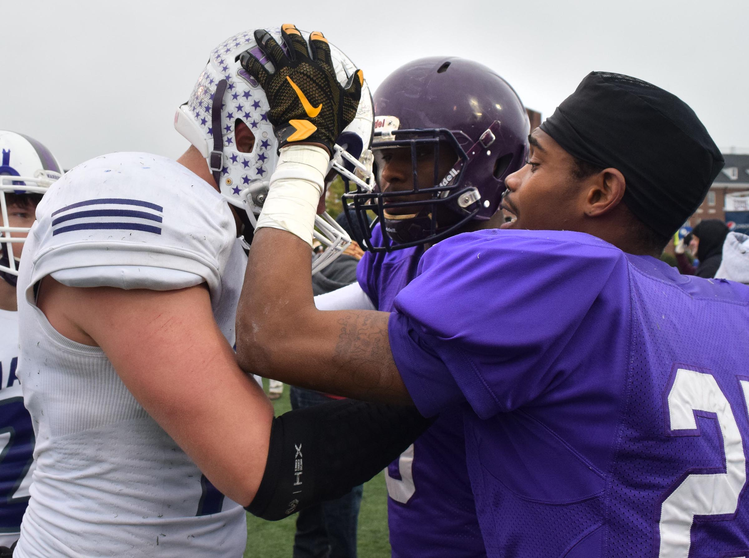 Trezevant players Cordarian Richardson (5) and Jonathan Gatewood (25) congratulate Alex Kirdendoll (17) on his play in Marion's losing effort. The Marion County Warriors faced the Memphis Trezevant Bears in the Class AA TSSAA State Football Championship played in the BlueCross Bowl at Tennessee Tech in Cookeville on December 3, 2016.