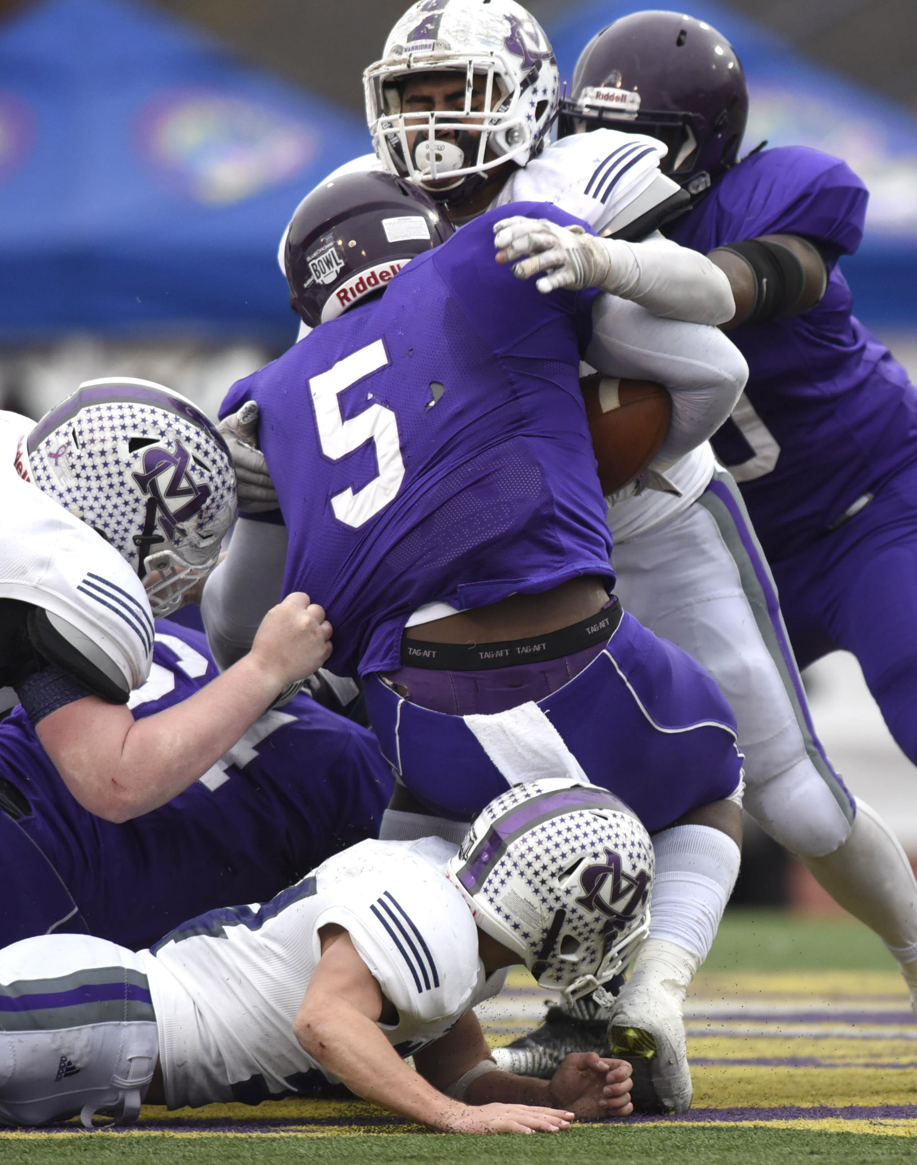 Marion County's Ismael Avila (78) stops Trezevant's Cordarrian Richardson (5) for no gain. The Marion County Warriors faced the Memphis Trezevant Bears in the Class AA TSSAA State Football Championship played in the BlueCross Bowl at Tennessee Tech in Cookeville on December 3, 2016.