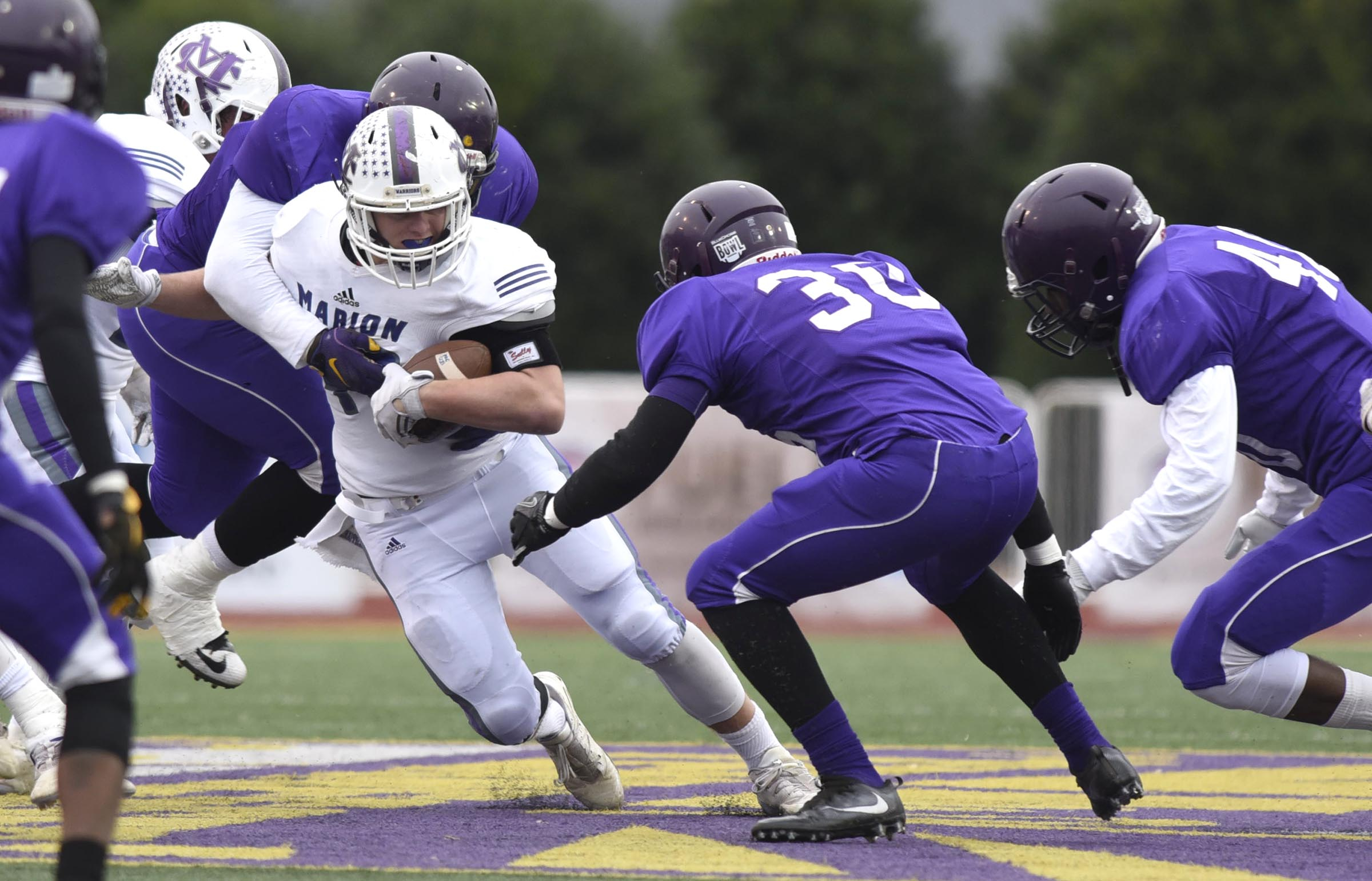 Marion County's Hunter McClain (40) is surrounded by Bear defenders. The Marion County Warriors faced the Memphis Trezevant Bears in the Class AA TSSAA State Football Championship played in the BlueCross Bowl at Tennessee Tech in Cookeville on December 3, 2016.