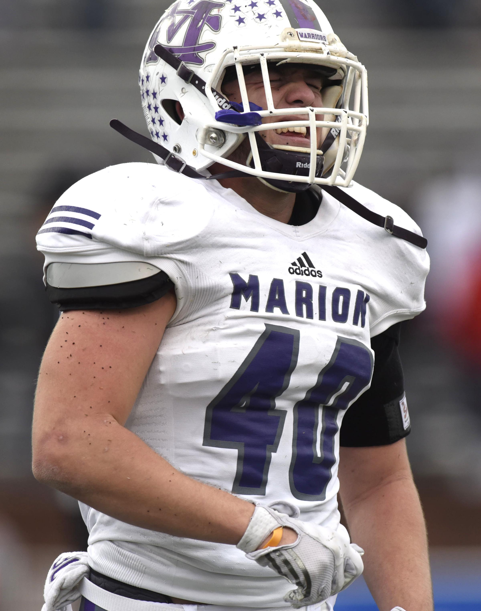 Marion County's Hunter McClain (40) grimaces in pain as he leaves the field. The Marion County Warriors faced the Memphis Trezevant Bears in the Class AA TSSAA State Football Championship played in the BlueCross Bowl at Tennessee Tech in Cookeville on December 3, 2016.