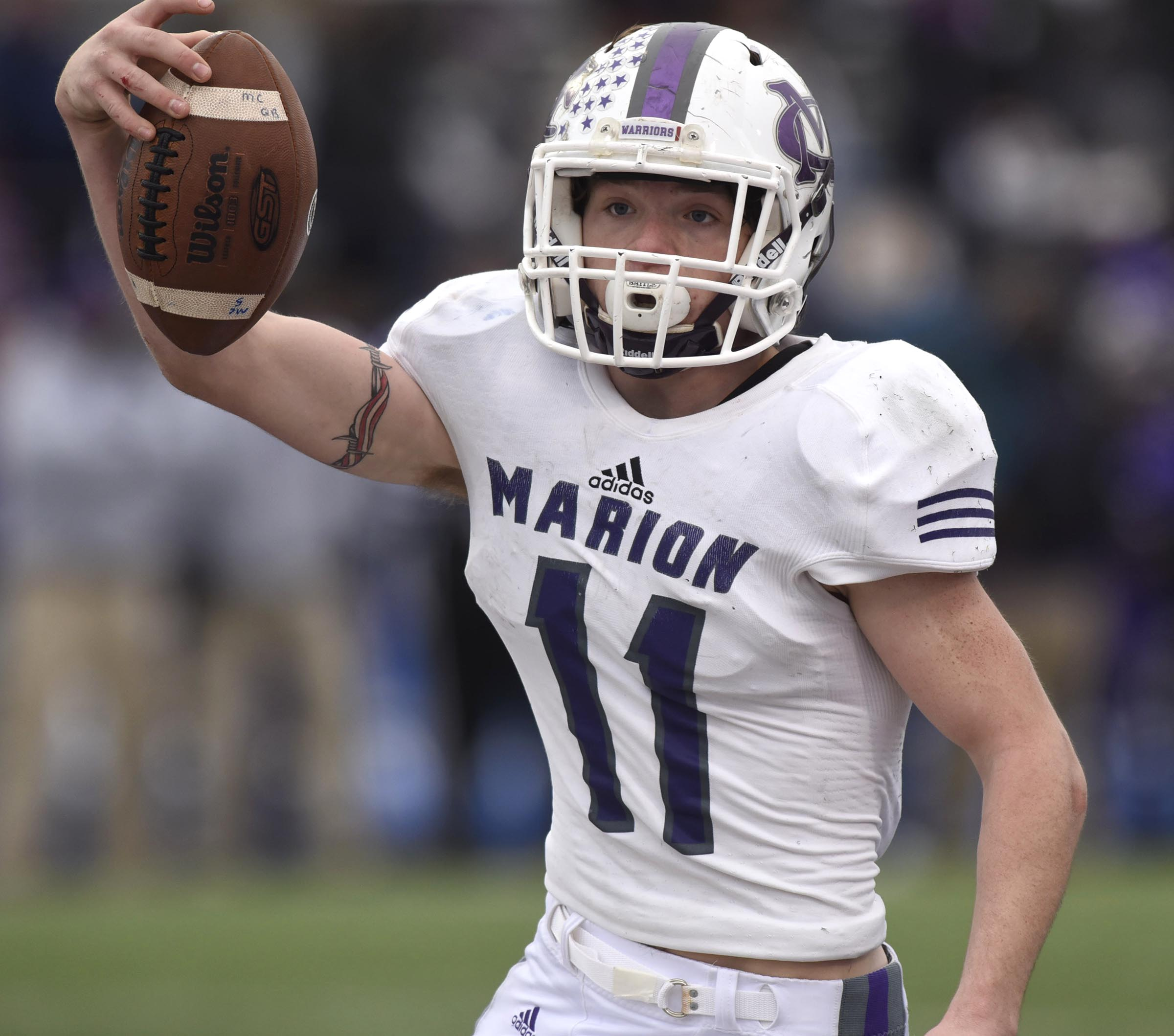 Marion County's Hunter Zeman (11) celebrates a late first half touchdown. The Marion County Warriors faced the Memphis Trezevant Bears in the Class AA TSSAA State Football Championship played in the BlueCross Bowl at Tennessee Tech in Cookeville on December 3, 2016.