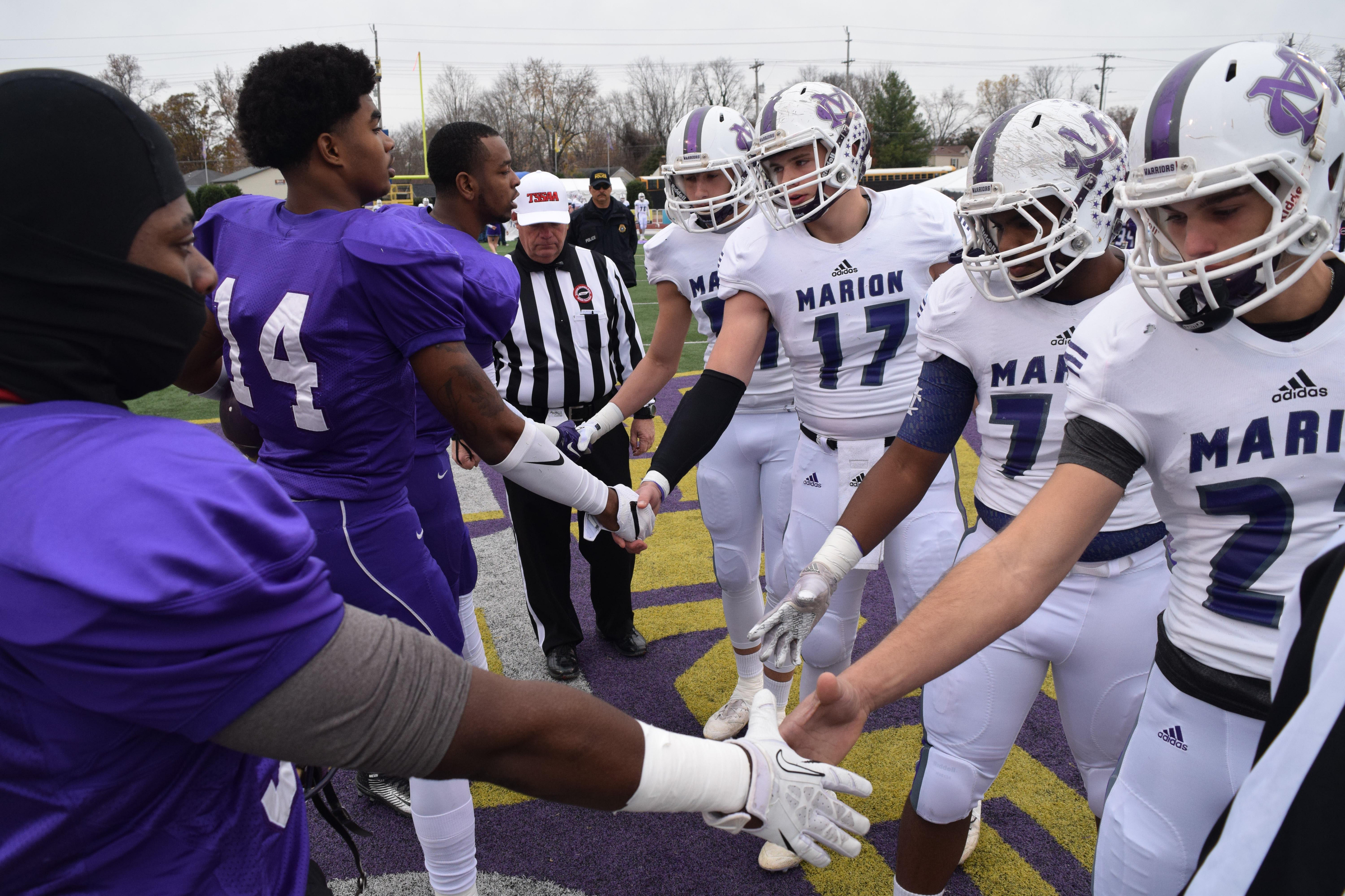 The team captains shake hands before the coin toss. The Marion County Warriors faced the Memphis Trezevant Bears in the Class AA TSSAA State Football Championship played in the BlueCross Bowl at Tennessee Tech in Cookeville on December 3, 2016.