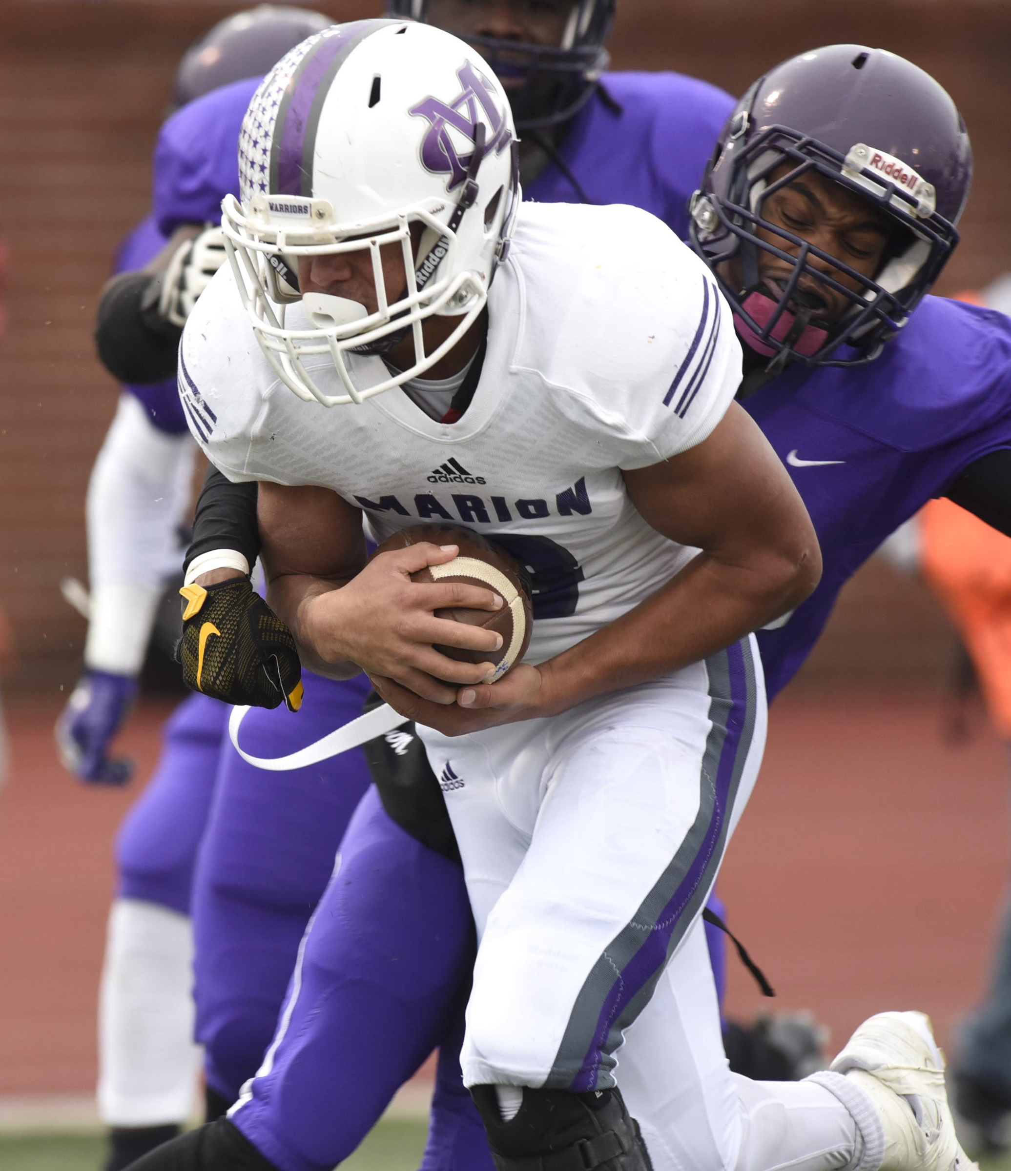 Marion County's Jacob Saylors (8) gets a big gain that set up the first Warrior touchdown. The Marion County Warriors faced the Memphis Trezevant Bears in the Class AA TSSAA State Football Championship played in the BlueCross Bowl at Tennessee Tech in Cookeville on December 3, 2016.
