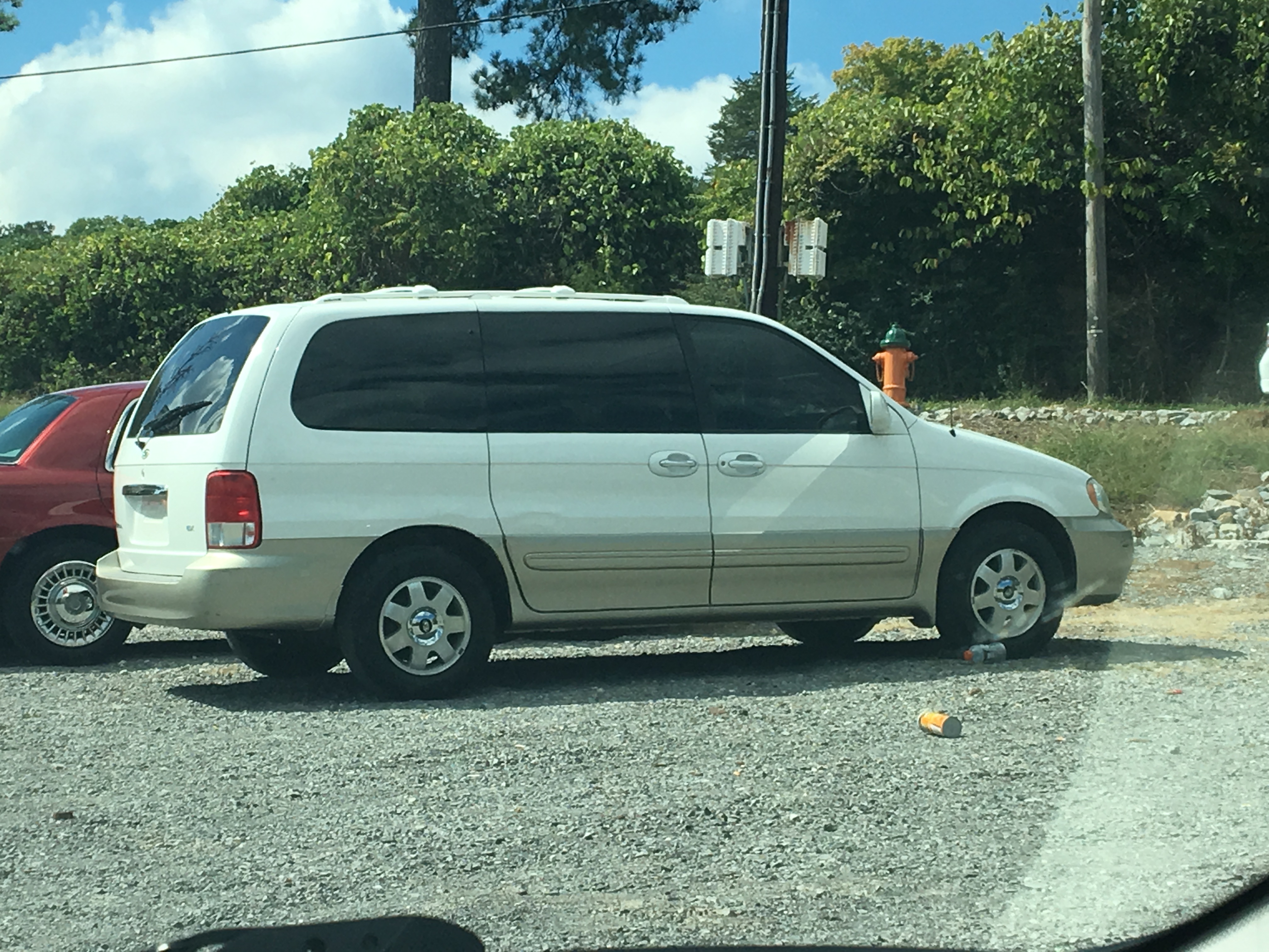 Two of Sheriff Eric Watson's cars sit off South Ocoee Street in Cleveland, near Wholesale Supply.