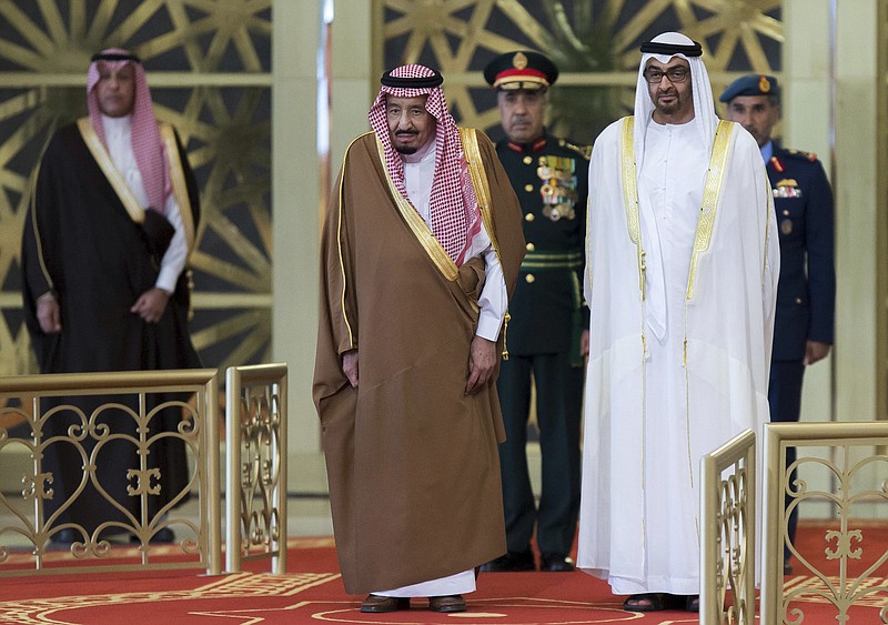 
              In this Saturday Dec. 3, 2016 photo released by Emirates News Agency, WAM, Sheikh Mohamed bin Zayed Al Nahyan, Crown Prince of Abu Dhabi and Deputy Supreme Commander of the UAE Armed Forces, right, receives Saudi King Salman in Abu Dhabi, United Arab Emirates. King Salman has arrived in the United Arab Emirates to begin a regional tour aimed at strengthening relations with four neighboring Gulf allies. (Emirates News Agency via AP)
            