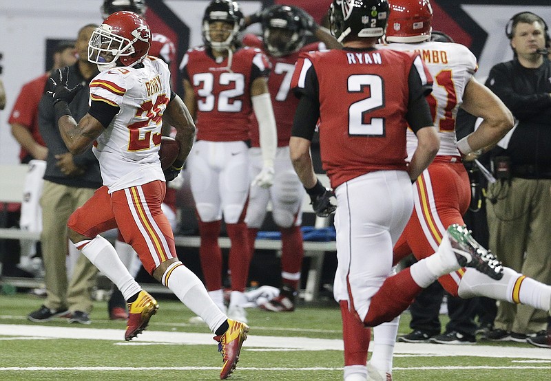 
              Kansas City Chiefs strong safety Eric Berry (29) runs back an intercepted ball from a Atlanta Falcons two-point conversion during the second half of an NFL football game, Sunday, Dec. 4, 2016, in Atlanta. (AP Photo/Chuck Burton)
            