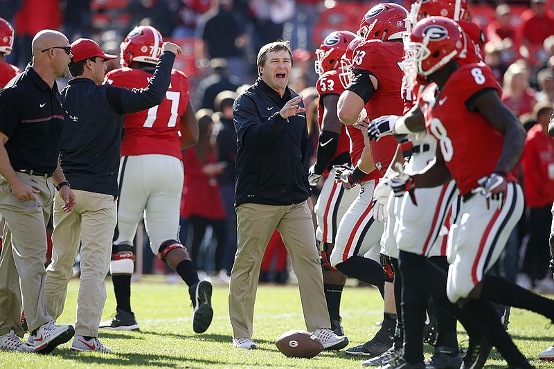 Georgia head coach Kirby Smart prepares for a game against Georgia Tech in an NCAA college football game Saturday, Nov. 26, 2016, in Athens, Ga. (AP Photo/Brett Davis)