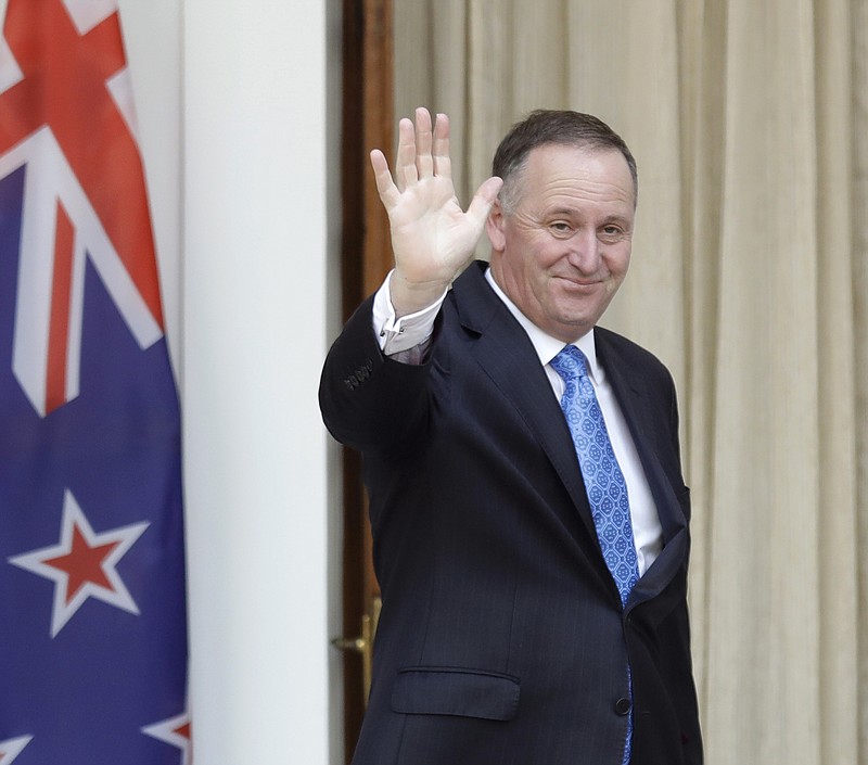 
              FILE - In this Oct. 26, 2016 file photo, New Zealand's Prime Minister John Key waves to media before his meeting with Indian counterpart Narendra Modi in New Delhi, India. John Key stunned the nation on Monday, Dec. 5 when he announced he was resigning after eight years as leader. (AP Photo/Manish Swarup, File)
            