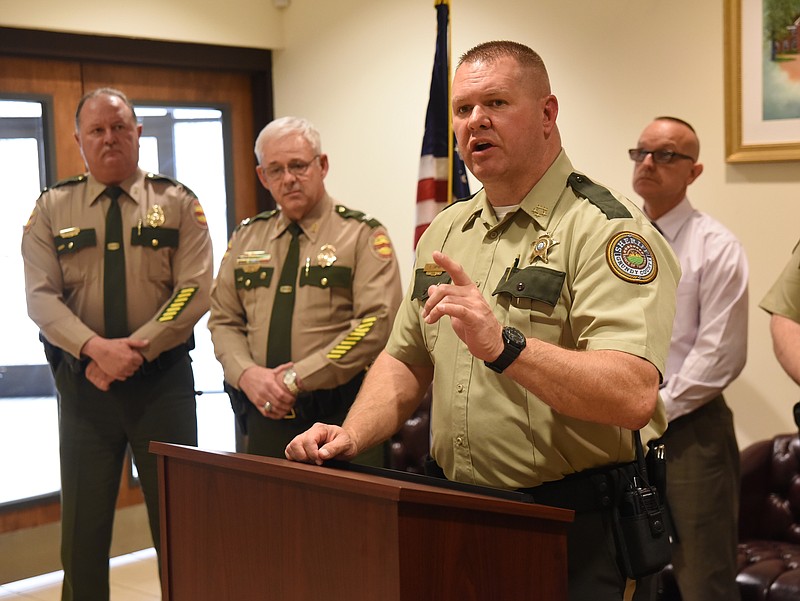 Tennessee Highway Patrol Col. Tracy Trott, second from left, listens as Grundy County Sheriff Clint Shrum talks about a fatality-free year on Grundy roadways for the year of 2015. From left are Capt. Jeff Mosley, Trott, Shrum and Monteagle Chief of Police Virgil McNeece.