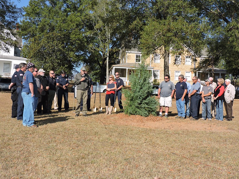 The city of Fort Oglethorpe dedicates its Christmas tree during a ceremonial tree planting at the Polo Field.