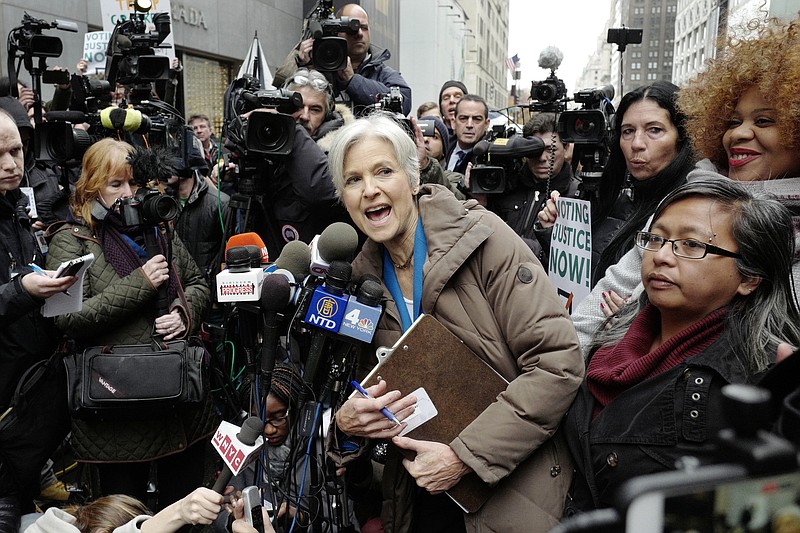 
              Jill Stein, the presidential Green Party candidate, speaks at a news conference in front of Trump Tower, Monday, Dec. 5, 2016, in New York. Stein is spearheading recount efforts in Pennsylvania, Michigan and Wisconsin.   (AP Photo/Mark Lennihan)
            