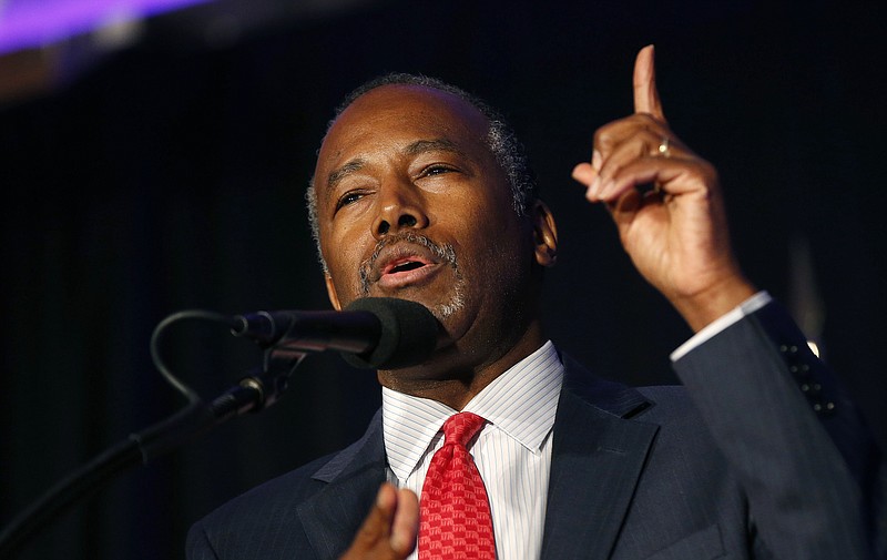 
              FILE - In this Aug. 25, 2016, file photo, former Republican presidential candidate Dr. Ben Carson speaks before Republican presidential candidate Donald Trump's arrival at a campaign rally in Manchester, N.H. President-elect Donald Trump chose Carson to become secretary of the Department of Housing and Urban Development. Trump's decision, announced early Monday, Dec. 5, by his transition office at Trump Tower in New York, comes as the real estate mogul continues a series of interviews, meetings with aides and other sessions aimed at forming his administration. (AP Photo/Gerald Herbert, File)
            