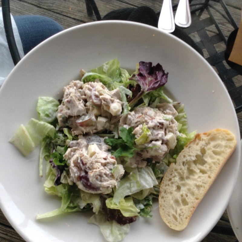 The Boathouse's Gingered Chunky Chicken is served on a bed of mixed lettuces and tossed with grapes, apples, toasted pecans and a creamy dressing.