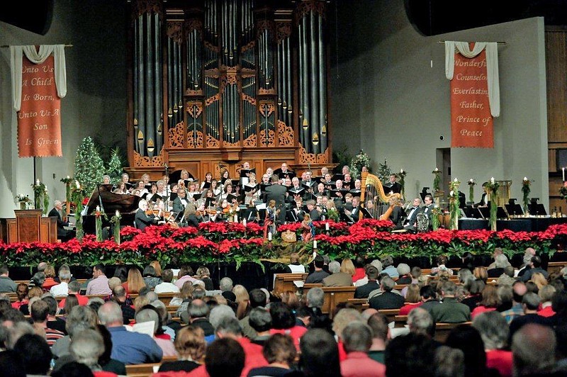 The Roueche Chorale's Candlelight Service of Lessons and Carols includes a full orchestra, as shown in this picture from a previous year. Performances are offered today and Friday at 7 p.m. at First Cumberland Presbyterian Church.