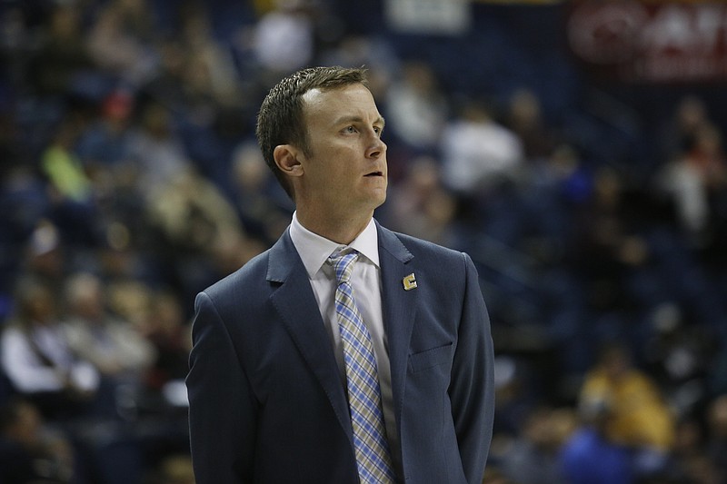 UTC men's basketball coach Matt McCall watches from the sidelines during the Mocs' basketball game against Louisiana-Monroe at Finley Stadium on Saturday, Dec. 3, 2016, in Chattanooga.