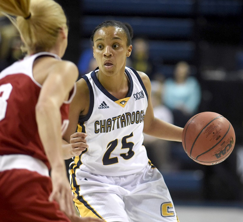 UTC senior point guard Chelsey Shumpert looks for an open teammate during the Mocs' game against Indiana last month at McKenzie Arena.