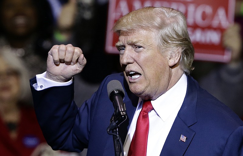 
              President-elect Donald Trump speaks to supporters during a rally in Fayetteville, N.C., Tuesday, Dec. 6, 2016. (AP Photo/Gerry Broome)
            