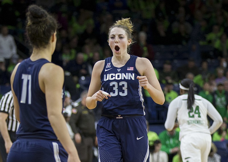 
              Connecticut's Katie Lou Samuelson (33) celebrates as she comes off the court following their 72-61 win over Notre Dame in an NCAA college basketball game, Wednesday, Dec. 7, 2016, in South Bend, Ind. (AP Photo/Robert Franklin)
            