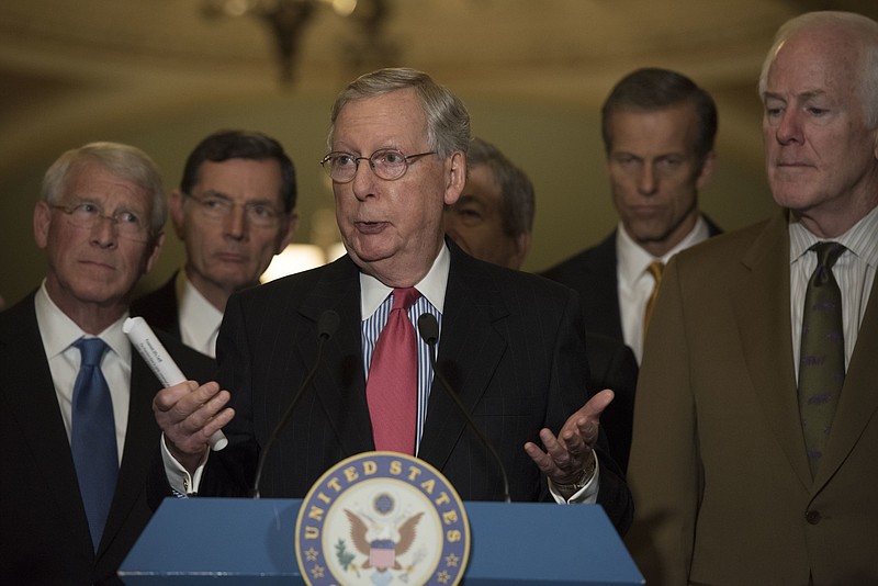 Senate Majority Leader Mitch McConnell of Ky. speaks to the media after the Republican policy luncheon on Capitol Hill in Washington, Tuesday, Dec. 6, 2016. From left are, Sen. Roger Wicker, R-Miss., Sen. John Barrasso, R-Wyo., McConnell, Sen. Roy Blunt, R-Mo., Sen. John Thune, R-S.D., and Senate Majority Whip John Cornyn of Texas. (AP Photo/Sait Serkan Gurbuz)