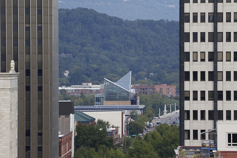 The Tennessee Aquarium and Market Street Bridge in downtown Chattanooga are seen from the roof of the Edney Building.