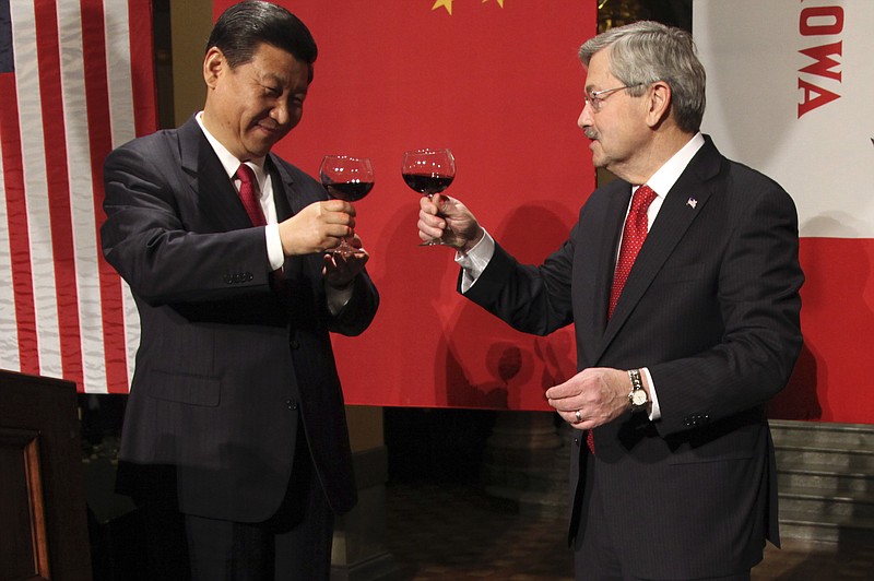 
              FILE - In this Feb. 15, 2012 file-pool photo, Chinese Vice President Xi Jinping and Iowa Gov. Terry Branstad raise their glasses at the beginning of a formal dinner in the rotunda at the Iowa Statehouse in Des Moines, Iowa. Branstad, President-elect Donald Trump's choice for U.S. ambassador to China, can boast a 30-year relationship with Chinese President Xi Jinping, the most powerful Chinese leader in decades, especially amid escalating talk of a trade war with the U.S.’s largest trading partner?  (AP Photo/The Des Moines Register, Andrea Melendez, Pool, File)
            