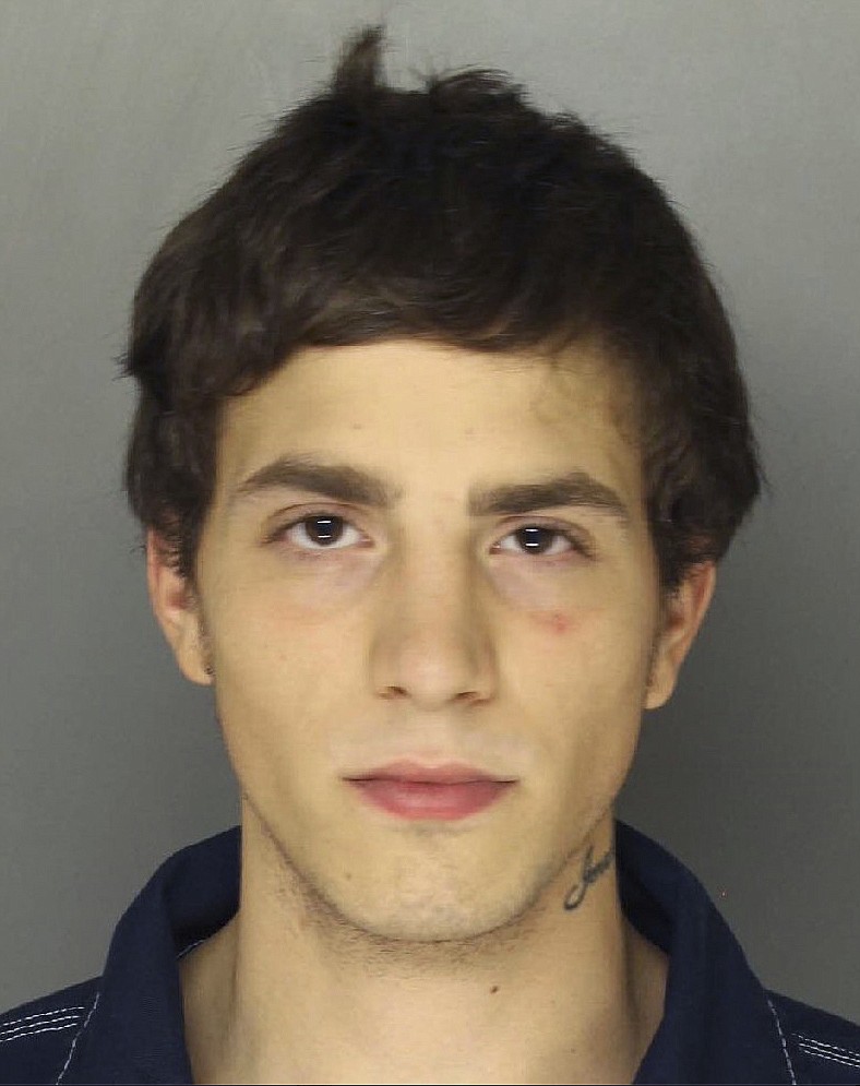 
              This photo provided  by Ephrata Police Department shows Jonathan Michael Steffy.  The Ephrata, Pa., Police Department posted on its Facebook page that officers were searching for a Steffy last Nov. 2016 over an outstanding bench warrant. They found the 23-year-old in a backyard but he fled. As they searched the area, one officer noticed a black cat in a nearby yard staring intently at a shed. The officer opened it and found the suspect.  (Ephrata Police Department via AP)
            